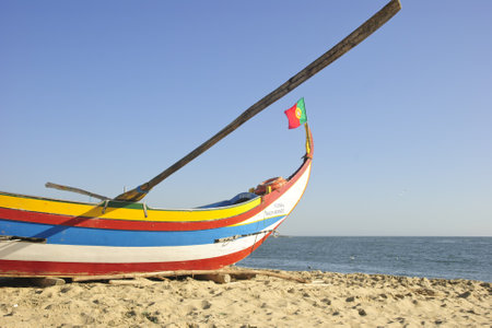 Typical portuguese fishing boat on the beach of Espinho, Portugalのeditorial素材