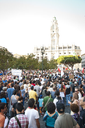 PORTO, PORTUGAL - SEPTEMBER 15: People protesting against government spending cuts and tax rises in Aliados square, Porto on September 15, 2012.のeditorial素材