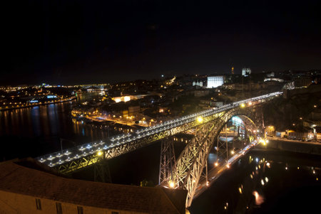 Bridge of Luis I at night over Douro river and Porto, Portugalのeditorial素材