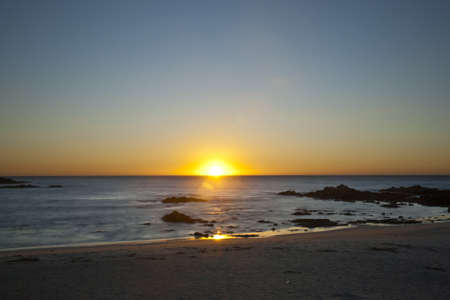 Long exposure of sunset at oceanの写真素材