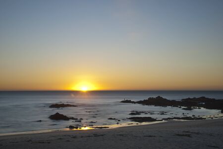 Long exposure of sunset at oceanの写真素材