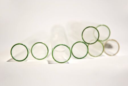 Empty epruvetes, common research equipment on white deskの写真素材