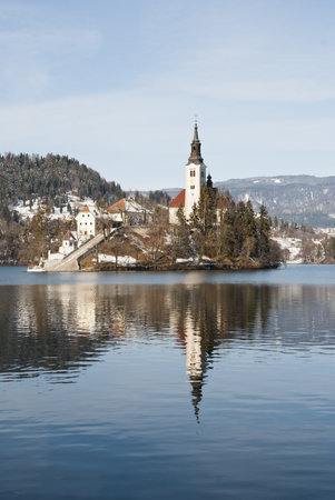 Lake Bled with castle behind in winter, Bled, Sloveniaのeditorial素材