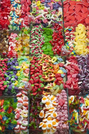 Candies to sell in market La Boqueria in Barcelonaの写真素材