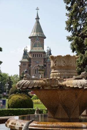 The orthodox cathedral of Timisoara with garden and wellの写真素材
