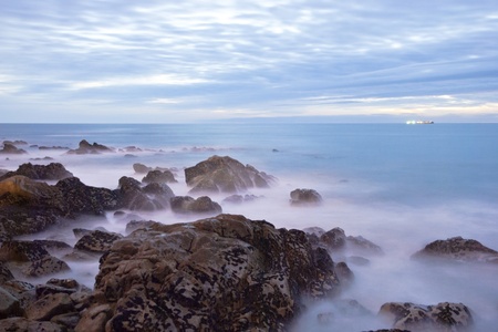 Long exposure of sea with rocks in the evening twilight
の写真素材