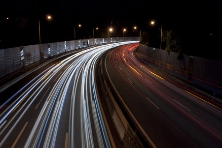 Long exposure of traffic on highway at nightの写真素材