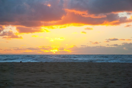 Colorful sunset over the oceanの写真素材