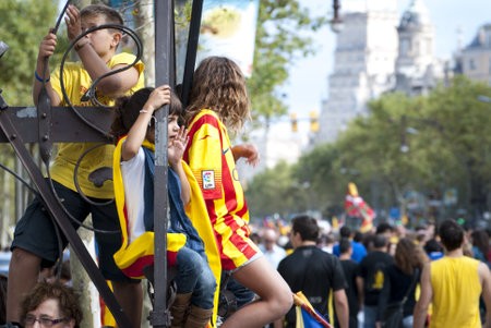 BARCELONA, SPAIN - SEPTEMBER 11: People joining the human chain "Catalan Way" crossing all Catalonia, silent demonstration for independent Catalonia in Barcelona, Spain on September 11, 2013のeditorial素材