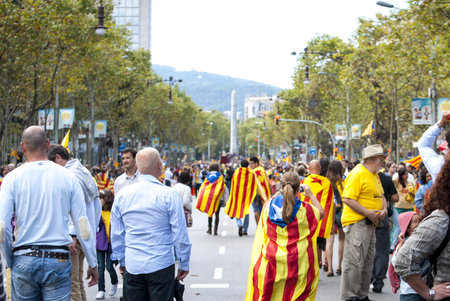 BARCELONA, SPAIN - SEPTEMBER 11: People joining the human chain "Catalan Way" crossing all Catalonia, silent demonstration for independent Catalonia in Barcelona, Spain on September 11, 2013のeditorial素材