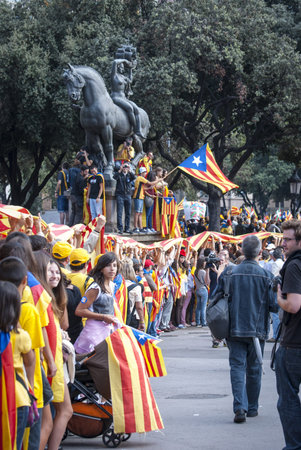 BARCELONA, SPAIN - SEPTEMBER 11: People joining the human chain Catalan Way crossing all Catalonia,...