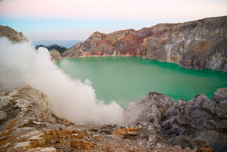 Kawah Ijen volcanic crater with lake at morning dawn, Java, Indonesiaの写真素材