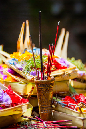 Hindu offerings and gifts to god in the temple in Bali, Indonesiaの写真素材