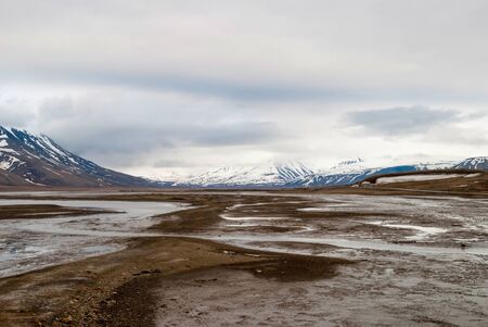 Landscape of Arctic tundra in early summer mud, Svalbardの写真素材