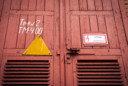 Old red industrial closed door, Barentsburg, Svalbard