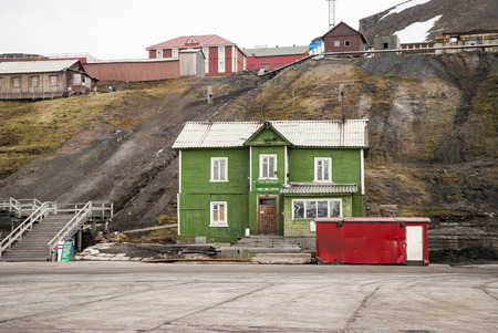 Old port sea office building in Barentsburg, russian settelement on Svalbard, Norwayの写真素材