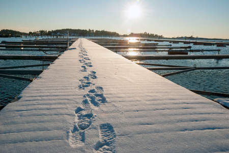 Small boat port in winter, Norwayの写真素材