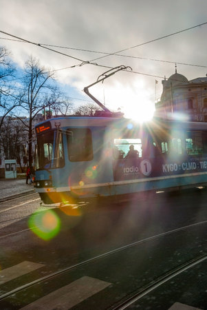 OSLO, NORWAY - JANUARY 29: Tram passing in Oslo downtown in sunny winter day. Taken in Oslo, January 29, 2015.のeditorial素材