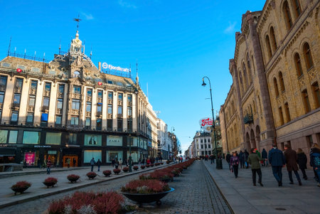 OSLO, NORWAY - JANUARY 29: People walking along the street in Oslo downtown in sunny winter day. Taken in Oslo, January 29, 2015.のeditorial素材