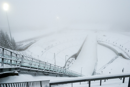 Holmenkollen ski jump in foggy winter day, Oslo, Norwayの写真素材
