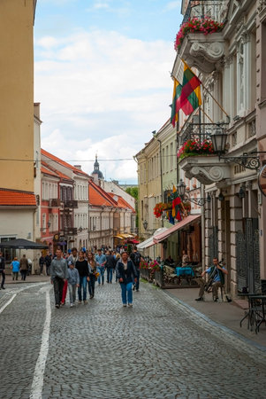 VILNIUS, LITHUANIA - JULY 12: Crowd of people walking in the street of Vilnius old town. July 2015のeditorial素材