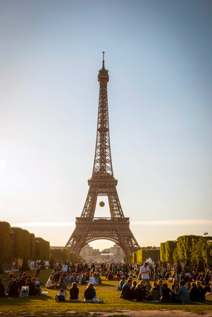 PARIS, FRANCE - JUNE 8: Eiffel tower with park around. Tower was designed by Gustave Eiffel and Stephen Sauvestre in 1889 and is one of main landmark of Paris. June 2015.のeditorial素材
