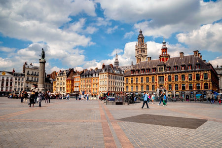 LILLE, FRANCE - JUNE 15: People passing Central town square, La Grand Place in Lille in afternoon on June 2015のeditorial素材
