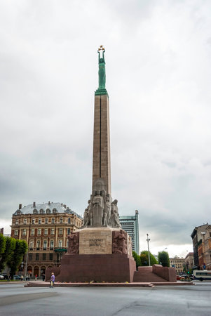 Freedom monument in Riga, Latvia on cloudy dayのeditorial素材