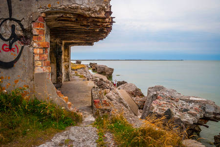 View on ruined building on Liepaja beach against of endless waterscape, Latviaの写真素材