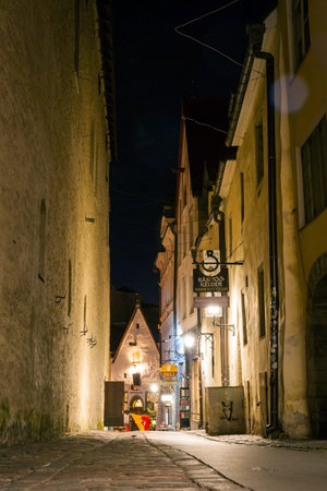 TALLINN, ESTONIA - AUGUST 19: View to illuminated street at night with artificial light in Tallinn old town. August 2015のeditorial素材
