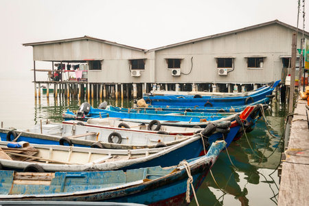 Jetty with residential houses and boats in Georgetown, Penang, Malaysiaのeditorial素材