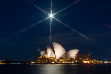 View on Sydney Opera at night with moon in the skyのeditorial素材