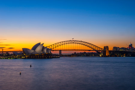 View on Sydney Opera house and harbour bridge at sunsetのeditorial素材