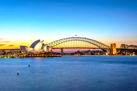 View on Sydney Opera house and harbour bridge at sunsetのeditorial素材