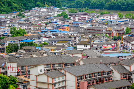 YANGSHUO CHINA - JUNE 12: View over rooftops and buildings of Yangshuo city Guilin prefecture. June 2016のeditorial素材