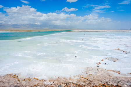 View over Chaqia (Chakayan) salt lake Qinghai China on sunny dayの写真素材
