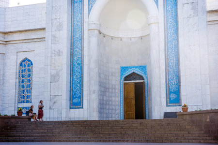 ALMATY, KAZAKHSTAN - JULY 11: People on the stairs in front of Almaty central mosque main entrance. July 2016のeditorial素材