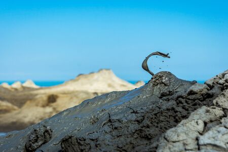 Mud volcano erupting mud, Gobustan park, Azerbaijanの写真素材
