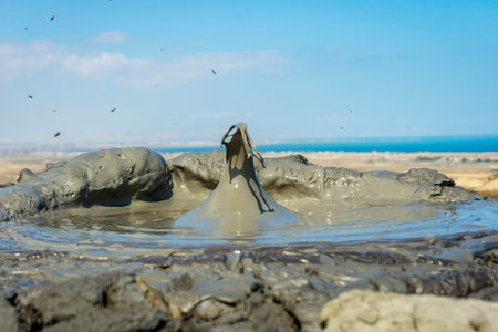 Mud volcano erupting mud bubble, Gobustan, Azerbaijanの写真素材