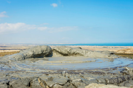 Mud volcano erupting mud bubble, Gobustan, Azerbaijanの写真素材