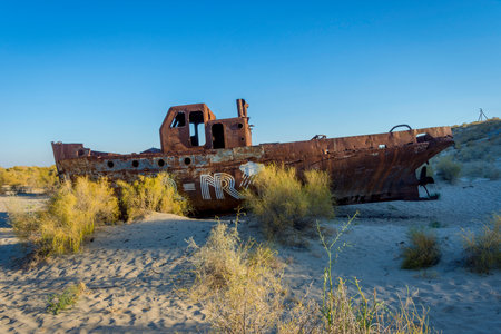 Old ships in the desert "ship cemetery" the consequence of Aral sea disaster, Muynak, Uzbekistanのeditorial素材