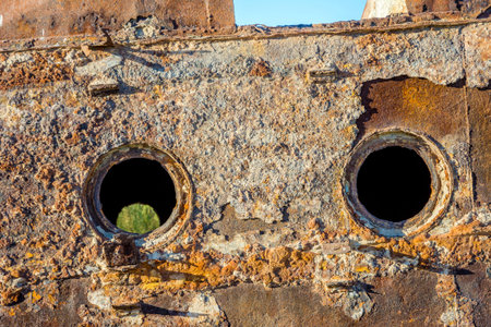 Old ships in the desert "ship cemetery" the consequence of Aral sea disaster, Muynak, Uzbekistanの写真素材