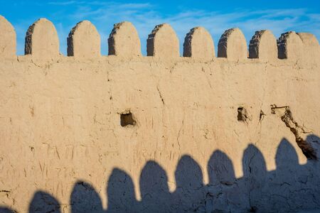Detail of city wall made of mud surrounding Khiva old town, Uzbekistanの写真素材