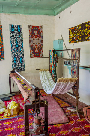 Loom in workshop for silk fabric production in traditional Uzbek patterns, Uzbekistanのeditorial素材