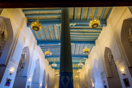 Interior with pillar and blue wooden ceiling of Registan madrasah, Samarkand, Uzbekistanのeditorial素材