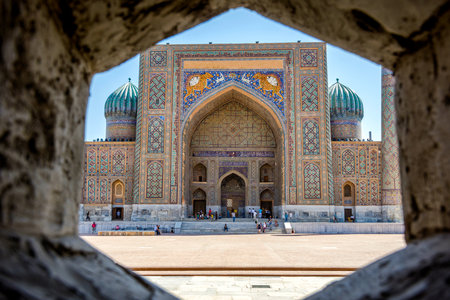 View to Sher Dor madrasah thru the wall, Samarkand Registan, Uzbekistanのeditorial素材