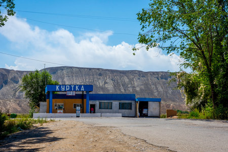 AK-TAL, KYRGYZSTAN - AUGUST 14: Gas station in a remote kyrgyz village on local road. August 2016のeditorial素材
