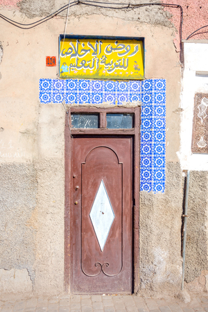 Crafted Moroccan door with tiles and patterns, Marrakech, Moroccoの写真素材