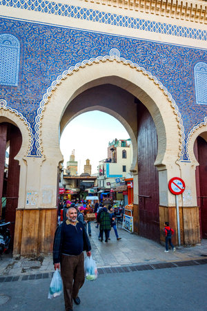 FEZ, MOROCCO - DECEMBER 9: People passing by the Fez old gate Bab Boujloud. December 2016のeditorial素材