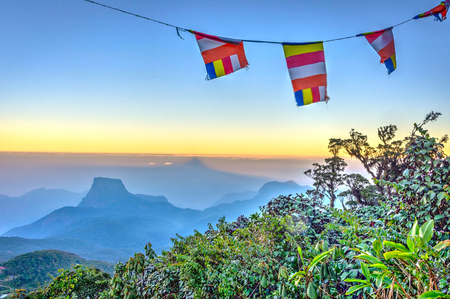 Adams peak mountain shadow over the mountain range, Sri Lankaの写真素材